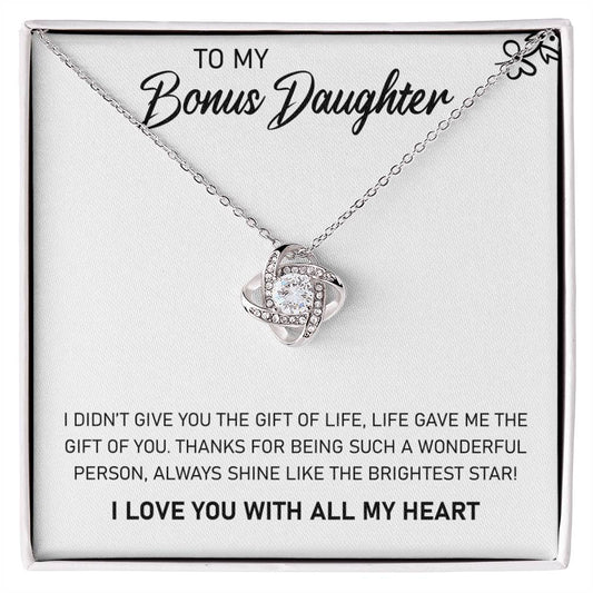 Love Knot Necklace in gift box with message to bonus daughter, featuring cubic zirconia pendant on silver chain