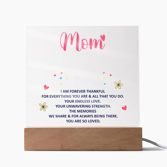 Printed square acrylic plaque with "Mom I am forever thankful" message on wooden LED base
