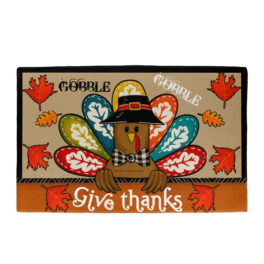 Give Thanks Turkey Welcome Mat with colorful feathers, autumn leaves, and "Give thanks" text for indoor or outdoor use