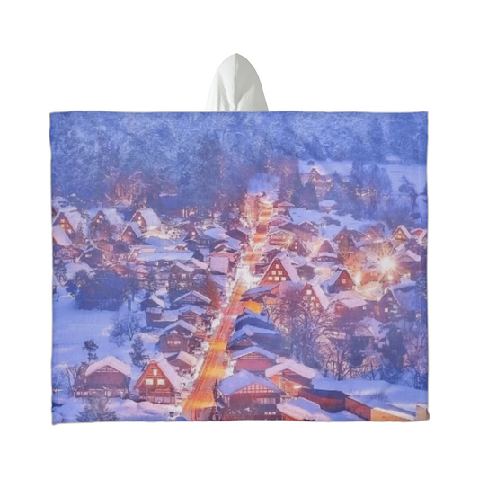 Winter Wonderland Hooded Sherpa Fleece Blanket with snowy village design and white fleece hood